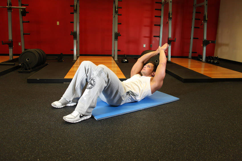Crunch - Hands Overhead — End position