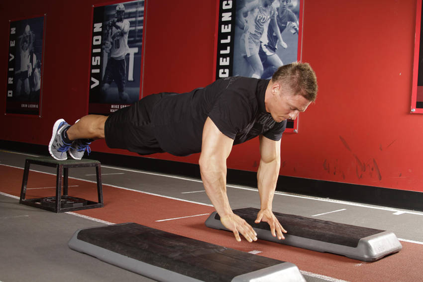 Incline Push-Up Depth Jump — End position