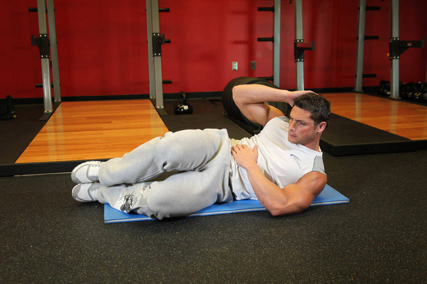 Oblique Crunches - On The Floor — End position