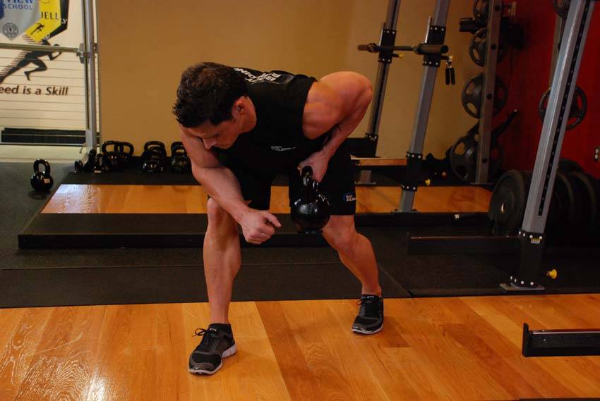 One-Arm Kettlebell Row — End position