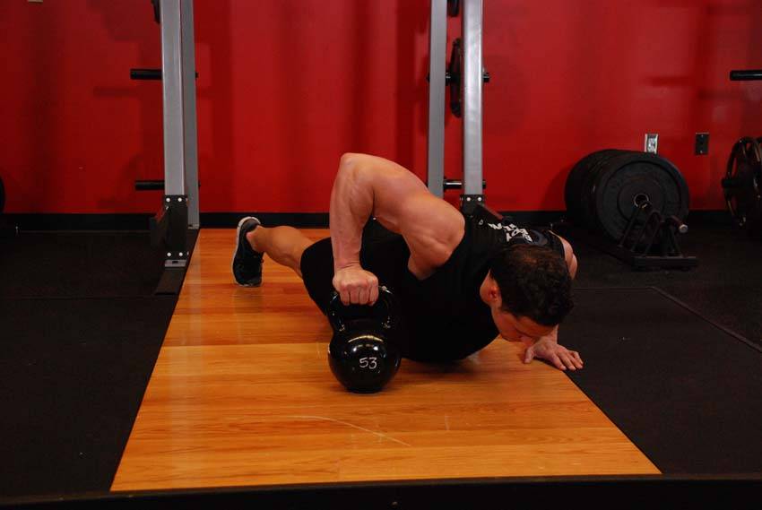 Plyo Kettlebell Pushups — End position