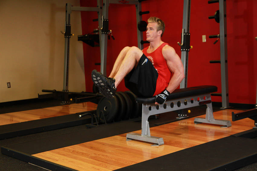 Seated Flat Bench Leg Pull-In — End position