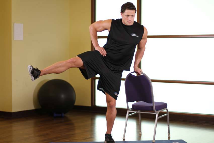 Side Leg Raises — End position