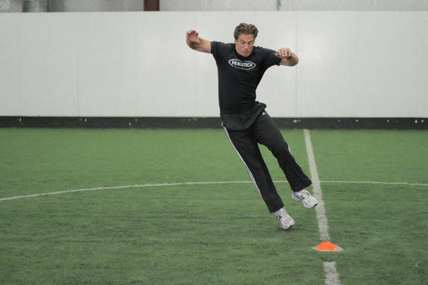 Side Standing Long Jump — End position