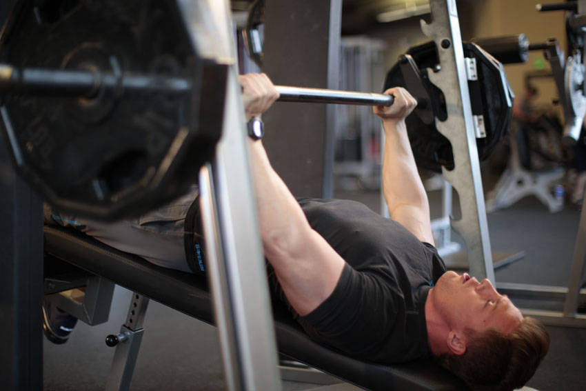 Smith Machine Decline Press — End position