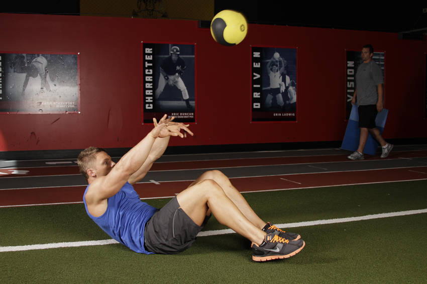 Supine Two-Arm Overhead Throw — End position