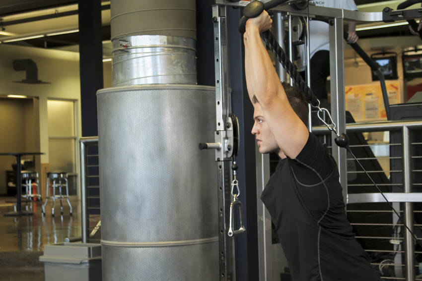 Triceps Overhead Extension with Rope — End position