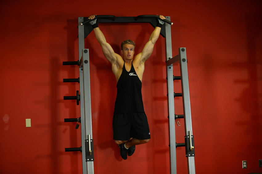 Wide-Grip Rear Pull-Up — End position